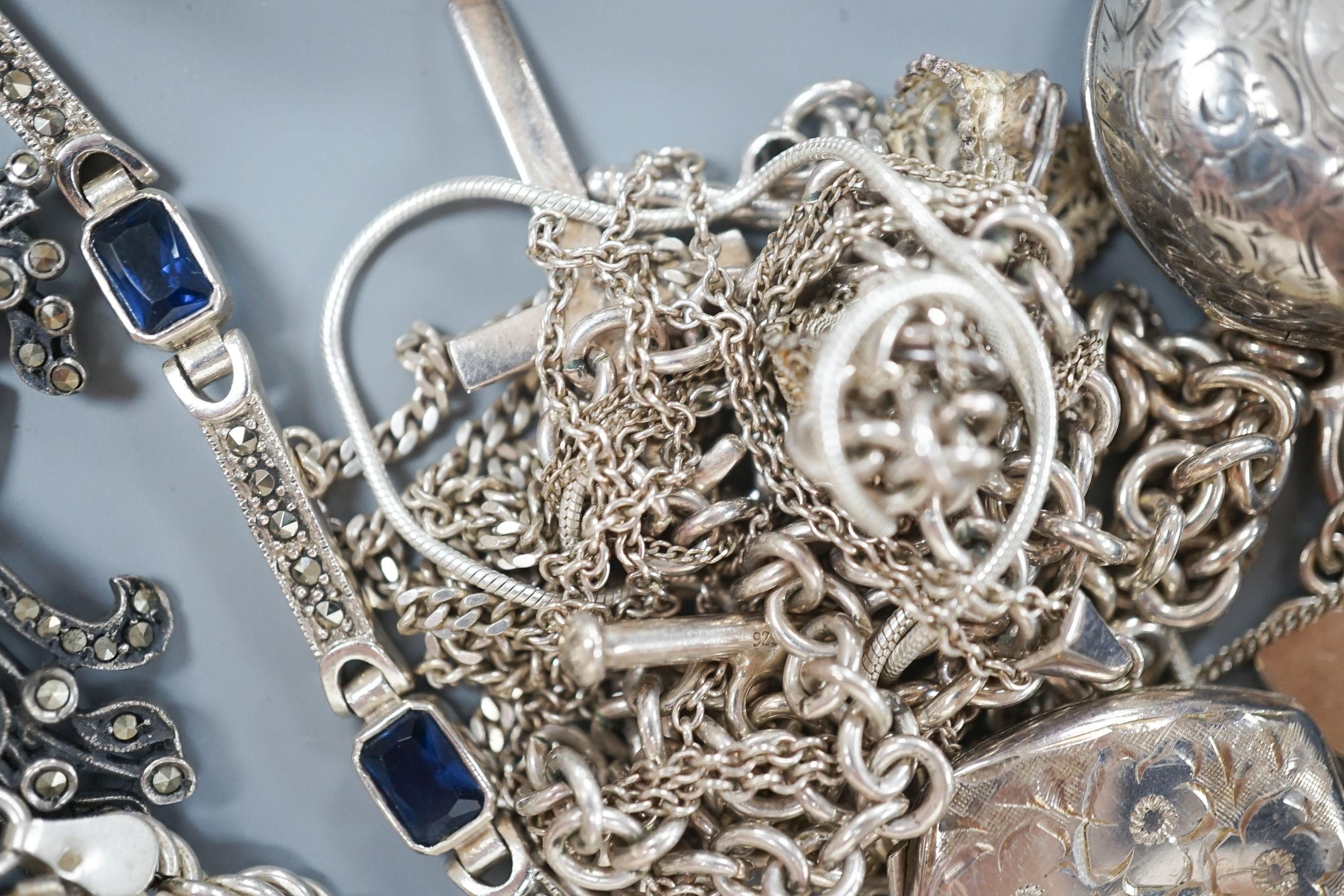 Mixed jewellery including silver and costume, together with a silver toastrack, a silver sovereign case, etc.